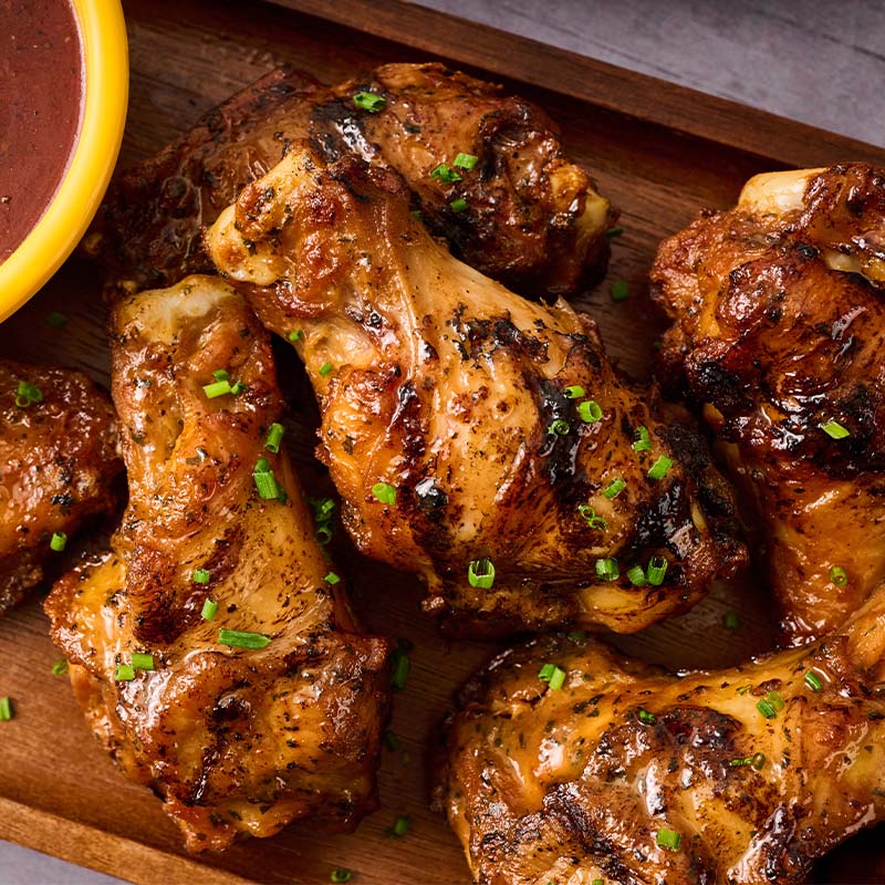 Flame-Grilled Wings on an appetizer tray
