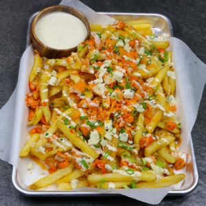 Buffalo Chicken Loaded French Fries in a Sheet Pan