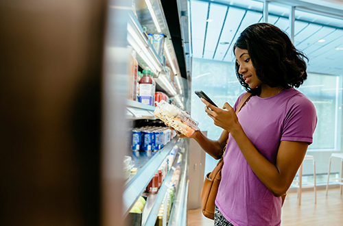 Woman shopping in a convenience store