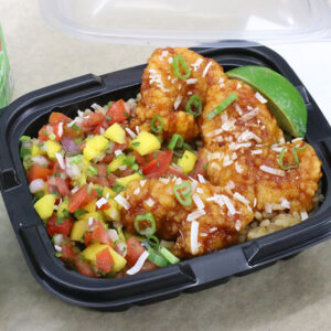 Boneless chicken wings and mango salsa atop brown rice in a to-go container