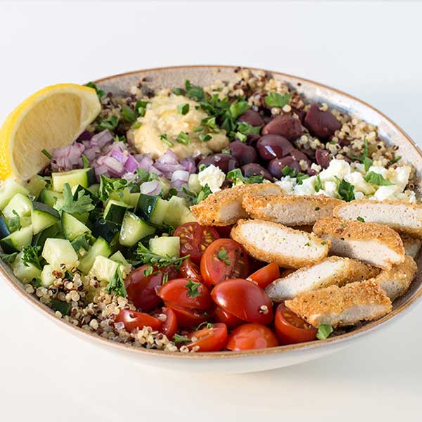 Bowl filled with chicken, veggies, and quinoa