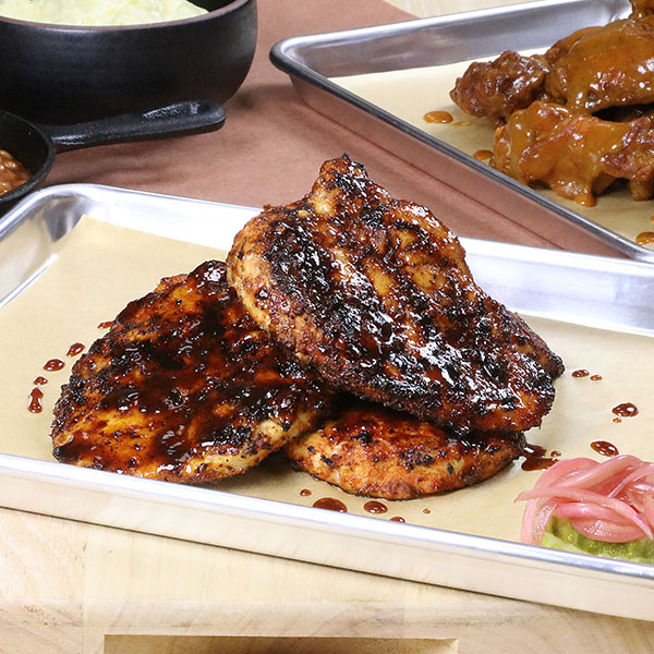 Chicken filets covered in Memphis-Style BBQ Sauce