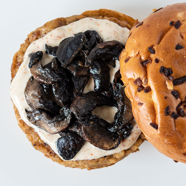 Chicken burger with mayo and mushrooms
