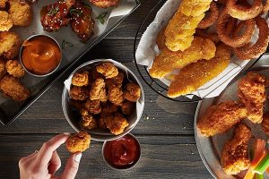 A delicious array of chicken wings, tenders and nuggets